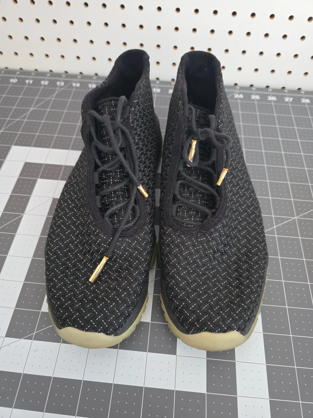 Jordan Men's Black Knit Sneakers with Gold Accents